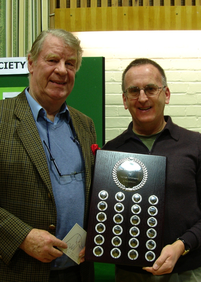 Ray Keppler (R) presents Patrick Holden with the Tewin Society Award plaque.